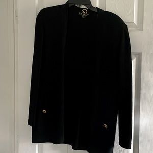 Black St. John used sweater jacket in Size P. Excellent condition.